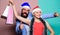 Lets get party. santa man and woman with tinsel. christmas shopping sales. winter holidays celebrate together. happy new