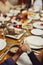 Lets give thanks first. Closeup shot of people holding hands in prayer before having a meal together.