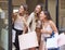 Lets head over that way. three attractive young women taking some time out to enjoy a shopping spree in the city.