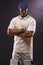 Lets hit the pitch. A cropped shot of an ethnic young man in cricket attire isolated on black.