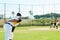 Lets start this game. a handsome young baseball player preparing to pitch a ball during a match on the field.