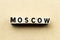 Letter block in word Moscow on wood background