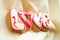 Letter cookies for Valentine`s day or for a wedding day on the background of coarse calico fabric.