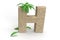 Letter H from the alphabet made of sand with palm trees for summer vacation