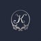 Letter K Decorative Crown Ring Alphabet Logo isolated on Navy Blue Background. Luxury Silver Initial Abjad Logo Design Template.
