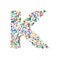 Letter k filled with dense watercolor confetti on.