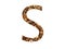 Letter S of the alphabet made with brown wood chips