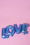 Letter-shaped balloons forming the word love