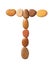 Letter T made of marine small pebbles, top view. Alphabet made of stones Isolated