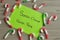 A letter to Santa Claus at the North Pole with candy canes
