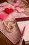Letter writing pen on Valentine\'s Day, hearts origami and a brac