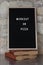 Letterboard with workout or pizza