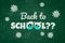 Lettering of back to school question because of coronavirus and new normal written with chalk effect on a blackboard background