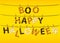 The letters and the inscription of a boo happy Halloween