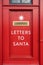Letters to Santa Mail Slot In Red Wall