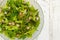 Lettuce Rocket Leaves With Chopped Radishes Salad in Glass Bowl