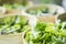 Lettuce salad leaves in bowls in restaurant display