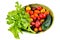 Lettuce yellow and red tomatoes, cherry tomatoes and cucumber on a vintage dish white background, isolate, top view