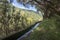 Levada das 25 fontes, irrigation canal detail view, touristic hiking trail, Rabacal, Madeira island, Portugal