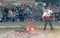 Leveling of hot coals before dancing at the Nestinar Games in the village of Bulgari, Bulgaria