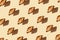 Levitating dessert croissant almonds beige seamless pattern