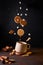 Levitation of cookies and marshmallows with and splash in cup on dark background
