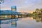 Lewiston - Clarkston blue bridge reflecting in the Snake River against evening sky on the border of Idaho and Washington states