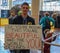 Lexington, KY US - March 11, 2018 - Lexington Comic & Toy Con A guy stands holding a sign