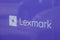 Lexmark logo text and sign of brand solutions and technologies world printer