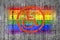 LGBT flag painted on background texture gray concrete with Handicapped sign