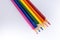 LGBT and Gay Pride rainbow colored pencils against a white background. Equality and Diversity concept - image