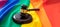 LGBT Law, Gay marriage. Judge gavel on rainbow color textile, close up. Transgender rights