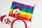 LGBT and New Years concept. Rainbow flag and New Year`s decor on a white background