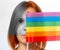 LGBT, portrait of an adult woman with the flag of freedom. The concept is an international symbol of the community of lesbian, gay