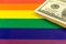 LGBT pride rights flag with money. Criminal, danger, gay and lesbian homosexual love background