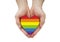 LGBT rainbow heart symbol of love in hands