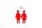 LGBT wedding. Female couple and rings on white background top-down copy space