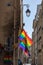 LGBTQ flags on corner of old building in Paris during pride. Transgender Pride flag