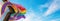 LGBTQ Inclusive Progressive Pride flag waving in the wind at cloudy sky. Freedom and love concept. Pride month. activism,