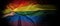 LGBTQ pride flag on black background. Lgbt rainbow flag in gay hand
