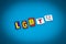 LGBTQ - word on blue background from colorful letters. Sexual minority. Text, headline, caption, heading on card, banner. Colorful