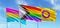 LGBTQIA+ flags waving in a blue sky background for Pride month, sexuality freedom, love diversity celebration and the fight for