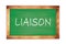 LIAISON text written on green school board