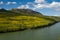 Liard River flows through foothills immersed in fall colors