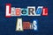 LIBERAL ARTS text word collage, colorful fabric on blue denim, humanities education