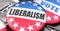 Liberalism and elections in the USA, pictured as pin-back buttons with American flag, to symbolize that Liberalism can be an