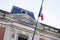 Liberte egalite fraternite text on french facade city hall means freedom equality fraternity with france blue white red flag on