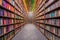 library bookshelves with rows of colorful hardcover books