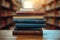 Library serenity Books stacked on wooden table, blurred bookshelf backdrop