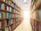 Library stacks of books and bookshelf with DOF effect and light